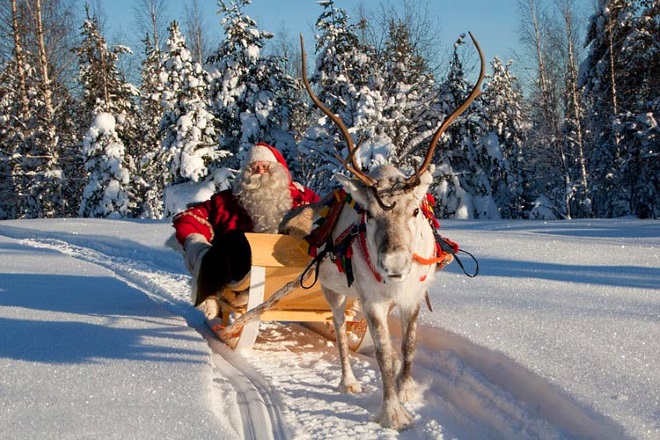Санта-Клаус и олень